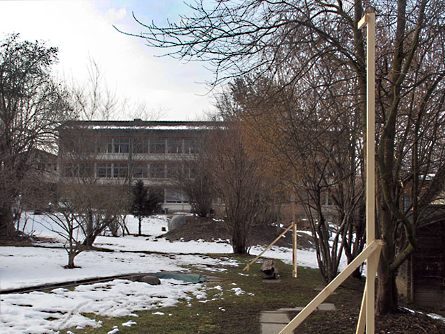 Schulanlage Wandermatte - Blick von Osten auf Bestand mit ausgestecktem neuen Kindergarten